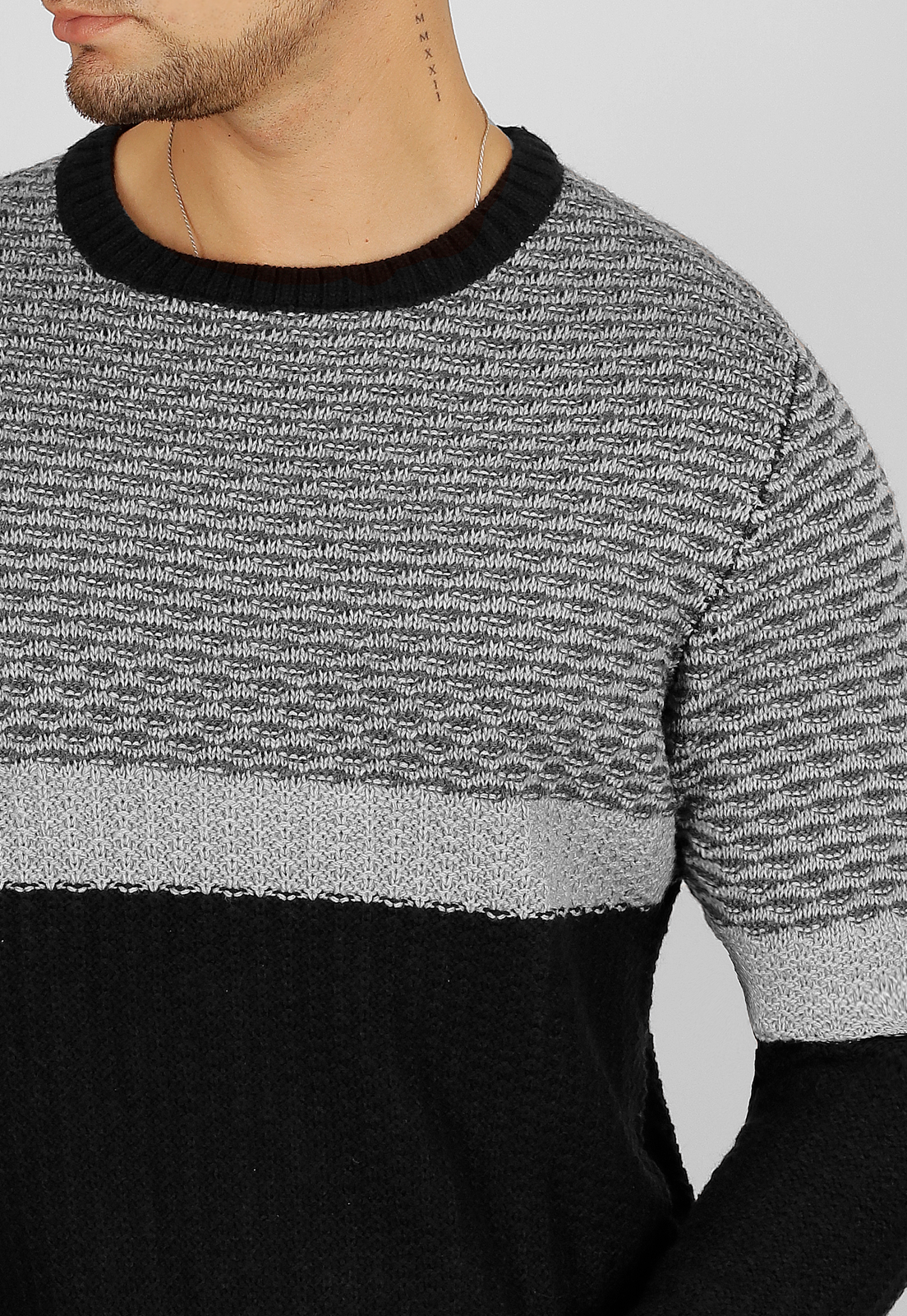 Sweater bicolor cuello polo